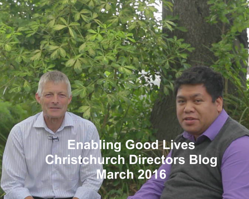 An image of Gordon Boxall, EGL Director and Jade Farrar a member of the National Leadership Group sitting outside surrounded by greenery.